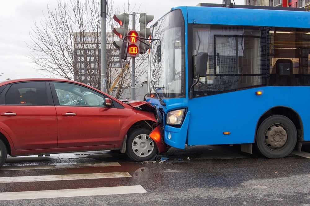 Frontal,Collision,Of,A,Car,And,A,Bus.,Head-on,Collision