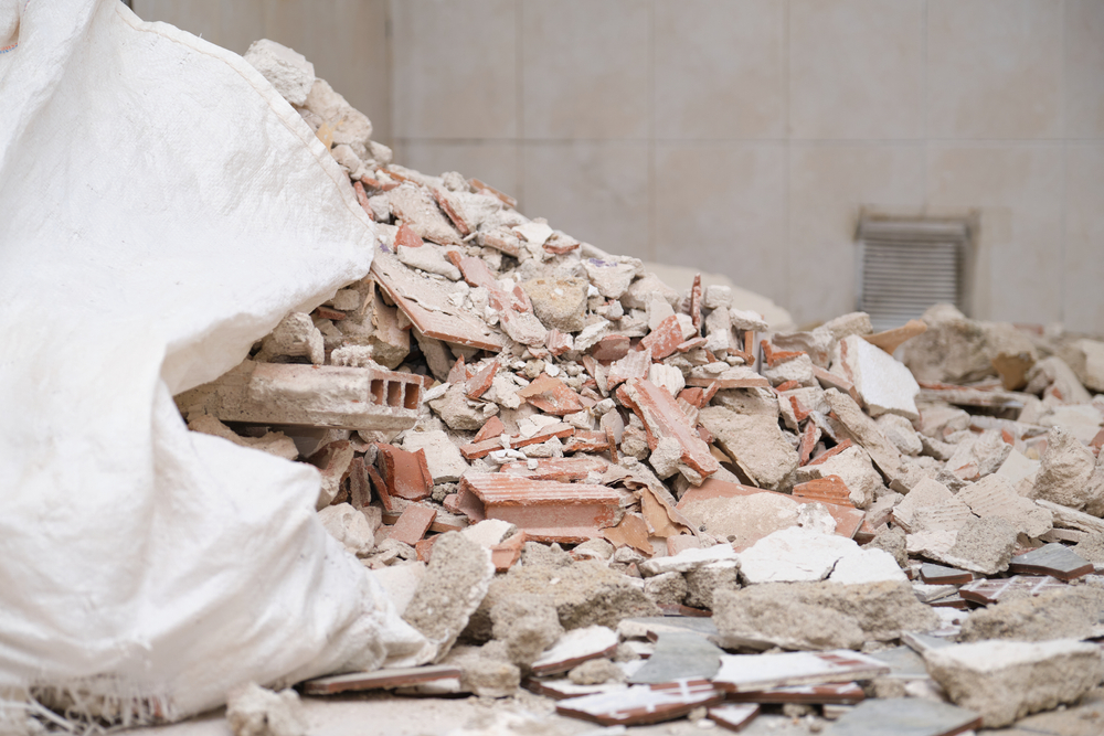 House,Debris,At,A,Construction,Site.,Concrete,And,Brick,Debris.