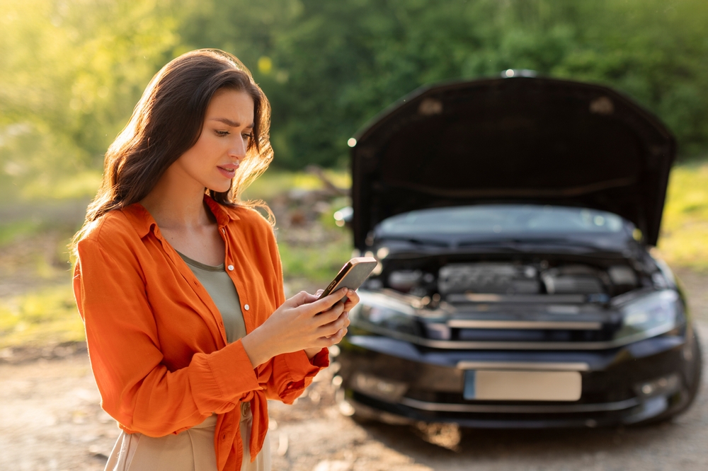 Sad,Woman,Has,Broken,Down,Car,On,Roadside,,Feeling,Stressed,