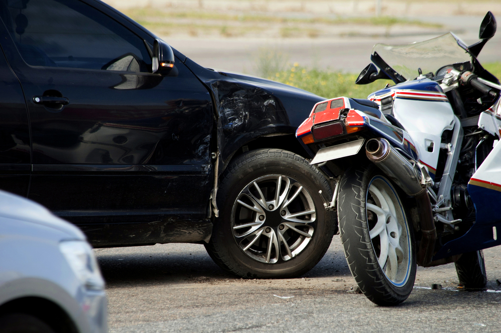 Crash,Moto,Bike,And,Car,On,Road