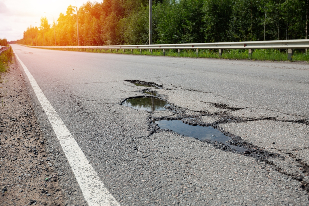 Potholes,On,Bad,Asphalt,Road.,Closeup.,Nobody